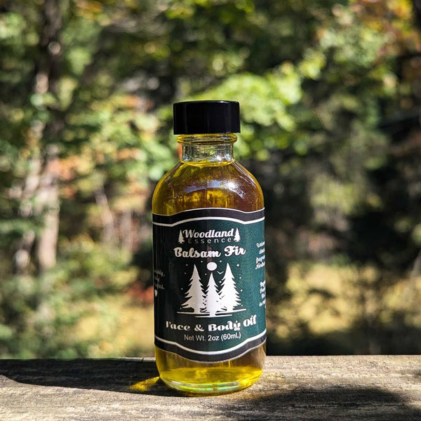 glass bottle of balsam fir body oil 