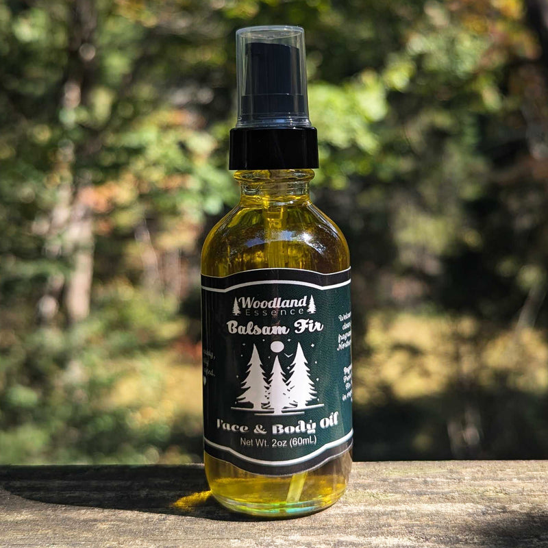 bottle of balsam fir body oil with pump
