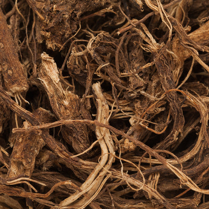 Close-up of dried herbs or roots with a brown color.