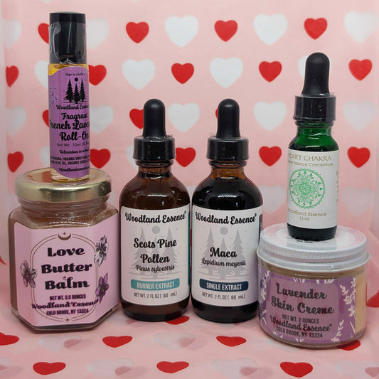 Collection of Woodland Essence products on a heart-patterned background